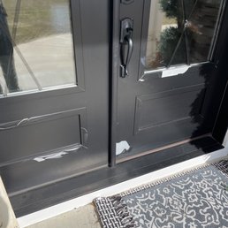 Second set of doors with paint peeling. Second set of doors with paint peeling.