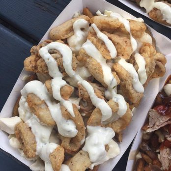 Le Grand Poutine Fest de Montréal - Fried Calamari Poutine - Festivals Near Me Le Grand Poutine Fest de Montréal - Fried Calamari Poutine - Festivals Near Me