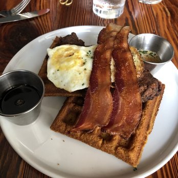 Sylvain - Chicken and Waffles with fried egg and bacon - Southern Near Me - New Orleans, Louisiana Sylvain - Chicken and Waffles with fried egg and bacon - Southern Near Me - New Orleans, Louisiana