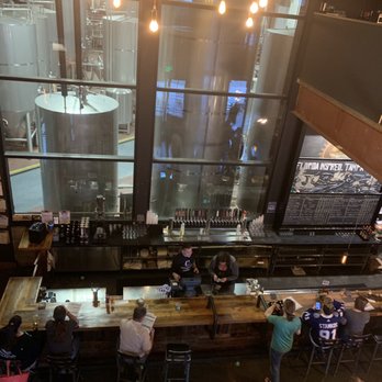Coppertail Brewing Co - Looking down on the 1st floor bar - Bars Near Me - Tampa, Florida Coppertail Brewing Co - Looking down on the 1st floor bar - Bars Near Me - Tampa, Florida