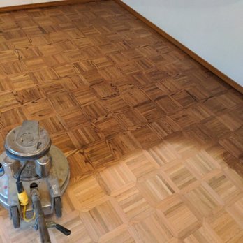 First Ascent Floors - a hardwood floor being sanded - Flooring Near Me