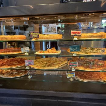 Regents Pizzeria - Monster mash, honey labubu, meat lover, brooklyner slices on the way - Pizza Near Me - San Diego, California