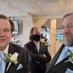 Steins At Sunset Florist - Groom and best man in front, a regular groomsman in the rear. All with different boutonnieres