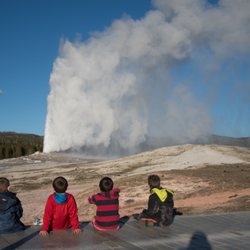 Tied To Nature - My boys watching Old Faithful erupt.