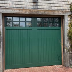 Ron Dulmaine & Sons Garage Doors - Fimbel brand pvc/vinyl carriage house style overhead garage door with bead board style design and a green factory finish