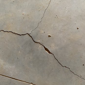 SK Builders - Cement Slab full of chips and cracks. Interior of home - Home Developers Near Me - Greer, South Carolina SK Builders - Cement Slab full of chips and cracks. Interior of home - Home Developers Near Me - Greer, South Carolina