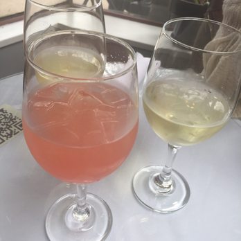 ROAM Cafe - Samosa (pink) and two glasses of wine - New American Near Me - Rochester, New York ROAM Cafe - Samosa (pink) and two glasses of wine - New American Near Me - Rochester, New York