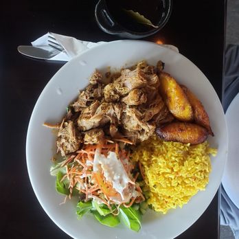 Sofrito Latin Cafe - Pork and yellow rice - Latin American Near Me - Orlando, Florida Sofrito Latin Cafe - Pork and yellow rice - Latin American Near Me - Orlando, Florida