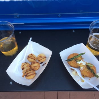 Blue Balls Bus - two trays of food and a glass of beer - Food Trucks Near Me