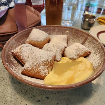 Milktooth - Beignets with pineapple whip and dulce de leche - Breakfast & Brunch Near Me - Indianapolis, Indiana Milktooth - Beignets with pineapple whip and dulce de leche - Breakfast & Brunch Near Me - Indianapolis, Indiana