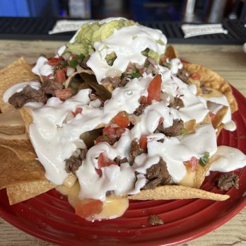 Kompali Taqueria - The nachos before I attacked them - Mexican Near Me - Milwaukee, Wisconsin Kompali Taqueria - The nachos before I attacked them - Mexican Near Me - Milwaukee, Wisconsin