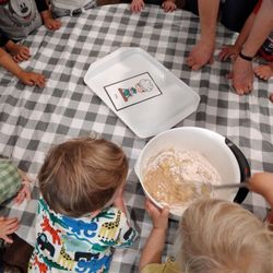 Mighty Tiger Preschool - Apple theme: Children take turns measuring and mixing ingredients to bake apple muffins