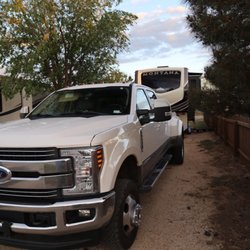 Texas Rv Park of Big Spring - Pull through site with privacy fence between