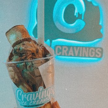 Cravings Ice Cream - Coffee and cookie ice cream on Waffle Puffle Cone with toasted marshmallow - Ice Cream & Frozen Yogurt Near Me - Bellflower, California Cravings Ice Cream - Coffee and cookie ice cream on Waffle Puffle Cone with toasted marshmallow - Ice Cream & Frozen Yogurt Near Me - Bellflower, California