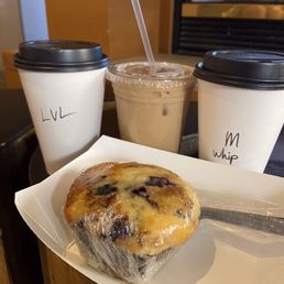 A Mocha, Iced Latte and a Lavender Latte. With a blueberry muffin. A Mocha, Iced Latte and a Lavender Latte. With a blueberry muffin.