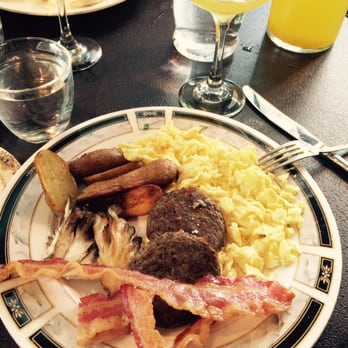 Mercat Bistro - Scramble eggs, mushrooms, sausage, bacon & of course... mimosas. - French Near Me - Dallas, Texas Mercat Bistro - Scramble eggs, mushrooms, sausage, bacon & of course... mimosas. - French Near Me - Dallas, Texas