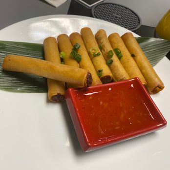 Filipino Flavors - Pork lumpia with sweet n spicy sauce - Filipino Near Me - Newberry, Florida Filipino Flavors - Pork lumpia with sweet n spicy sauce - Filipino Near Me - Newberry, Florida