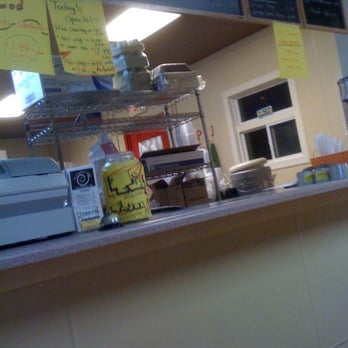 Pj's Hot Wings - a kitchen counter with many items on it - Chicken Wings Near Me - Carrollton, Georgia Pj's Hot Wings - a kitchen counter with many items on it - Chicken Wings Near Me - Carrollton, Georgia