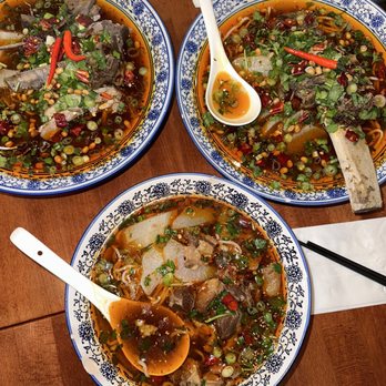 Noodle Dynasty - Spicy lamb bone in noodle soup (top left), Spicy beef bone in noodle soup (top right), Spicy beef noodle soup (bottom middle) - Chinese Near Me - Berkeley, California Noodle Dynasty - Spicy lamb bone in noodle soup (top left), Spicy beef bone in noodle soup (top right), Spicy beef noodle soup (bottom middle) - Chinese Near Me - Berkeley, California