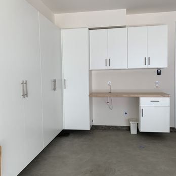 Garage Innovations - White cabinets with butcher block desk - Home Organization Near Me - Riverside, California Garage Innovations - White cabinets with butcher block desk - Home Organization Near Me - Riverside, California