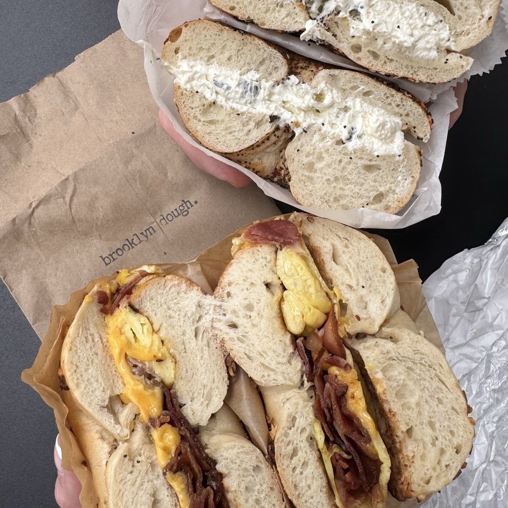 Brooklyn Dough - Bacon, Egg, & Cheese on Garlic Bagel and Spicy Everything Bagel w Jalapeño Cream Cheese - Bagels Near Me - Naples, Florida Brooklyn Dough - Bacon, Egg, & Cheese on Garlic Bagel and Spicy Everything Bagel w Jalapeño Cream Cheese - Bagels Near Me - Naples, Florida