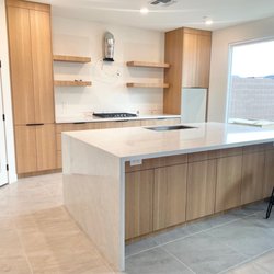 Dream Design - Modern kitchen design Cabinets - CLEAF Valley LR22 Counter top/waterfall island - pentalquartz Volakano