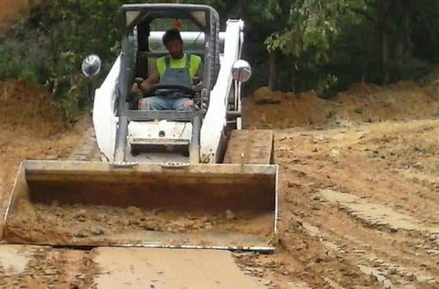 Slide of Roach and Family Septic Excavating & Drain Cleaning