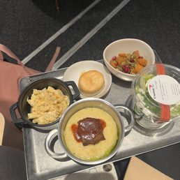 Mac & cheese, brisket & grits, dill pickle ranch salad, and Southwest sweet potatoes