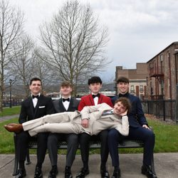 Dante Zeller Tuxedo by Sarno - A group of young people wearing prom formalwear