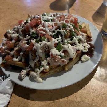 Taps Brewhouse - Chicken club poutine - Pubs Near Me - Niagara Falls, Ontario Taps Brewhouse - Chicken club poutine - Pubs Near Me - Niagara Falls, Ontario