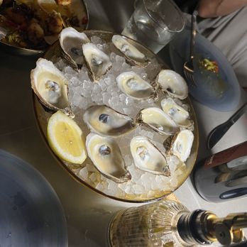 Bicyclette Cookshop - Oysters with their minuette sauce. Spectacular - New American Near Me - Naples, Florida Bicyclette Cookshop - Oysters with their minuette sauce. Spectacular - New American Near Me - Naples, Florida