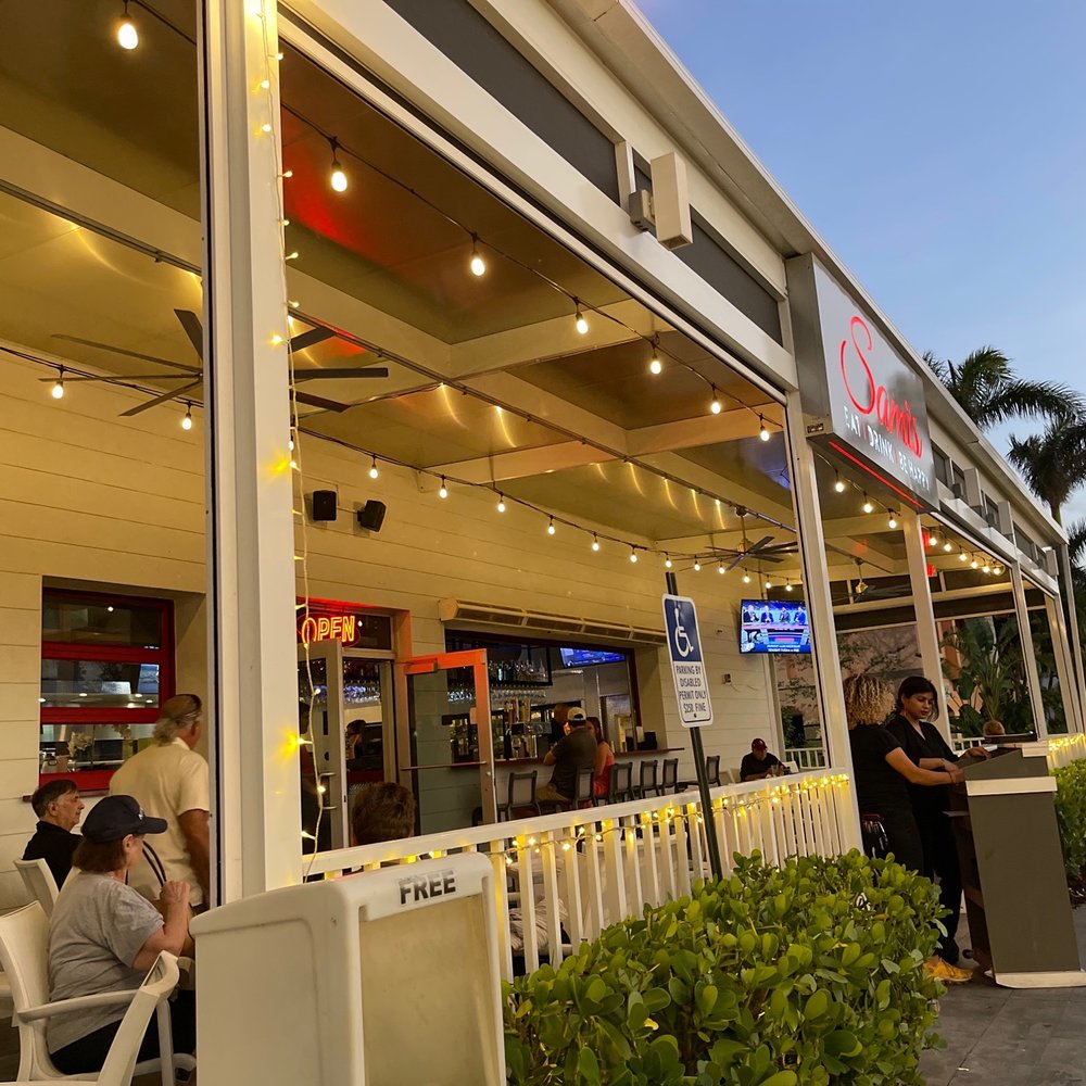 Sami's Marco Island - Exterior with outdoor seating - Pizza Near Me - Marco Island, Florida Sami's Marco Island - Exterior with outdoor seating - Pizza Near Me - Marco Island, Florida