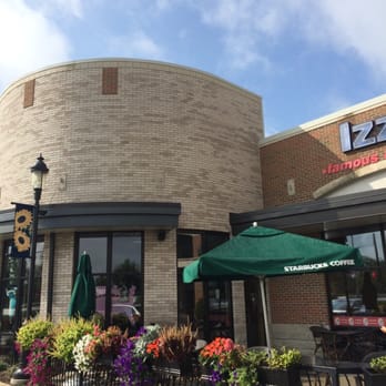 Starbucks - Pretty flower baskets on fence. - Coffee & Tea Near Me - Fairfield, Ohio Starbucks - Pretty flower baskets on fence. - Coffee & Tea Near Me - Fairfield, Ohio
