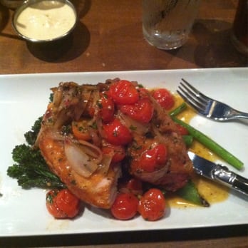 Neat Kitchen + Bar - 1/2 plate of chicken with broccolini and grape tomatoes - Bars Near Me - Westmont, Illinois Neat Kitchen + Bar - 1/2 plate of chicken with broccolini and grape tomatoes - Bars Near Me - Westmont, Illinois