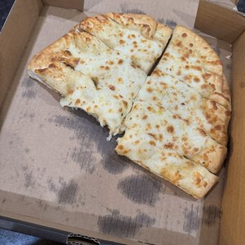 Crust Pizza Co. - Kingwood Place - It looks like my delivery driver got hungry and went to town on my cold cheesy bread. - Pizza Near Me - Kingwood, Texas Crust Pizza Co. - Kingwood Place - It looks like my delivery driver got hungry and went to town on my cold cheesy bread. - Pizza Near Me - Kingwood, Texas