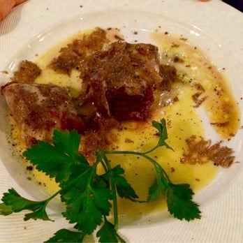 Quattro - Veal with Parmigiana Cheese in Truffle Oil with large shavings of Truffle Mushroom - Italian Near Me - Frankfurt, HE Quattro - Veal with Parmigiana Cheese in Truffle Oil with large shavings of Truffle Mushroom - Italian Near Me - Frankfurt, HE