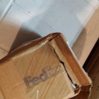 FedEx Ship Center - Another angle of the box that the lady rudely said was "torn" - Shipping Centers Near Me - Albuquerque, New Mexico