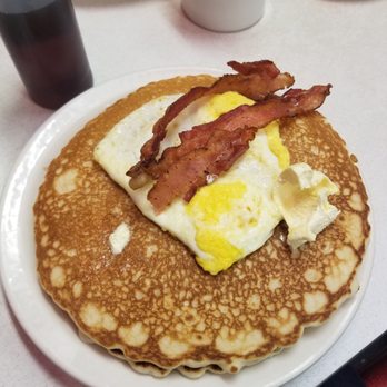 Oscar's Cafe - 2 hotcakes with bananas and chocolate chips (they are on the flipside), 2 eggs and bacon. - Breakfast & Brunch Near Me - Durango, Colorado Oscar's Cafe - 2 hotcakes with bananas and chocolate chips (they are on the flipside), 2 eggs and bacon. - Breakfast & Brunch Near Me - Durango, Colorado