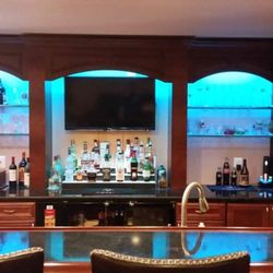 A&P Builders - Finished basement with bar