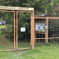 Woodcock Demonstration Gardens - Entry from Woodcock Road. This side of the gate is parking, then you walk through into the garden.