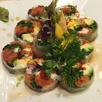 MINE Sushi - Garden Roll - Salmon, spicy tuna, avocado, cucumber and mango wrapped in soy bean paper. Ponzu sauce drizzled on top - Japanese Near Me - Markham, Ontario MINE Sushi - Garden Roll - Salmon, spicy tuna, avocado, cucumber and mango wrapped in soy bean paper. Ponzu sauce drizzled on top - Japanese Near Me - Markham, Ontario