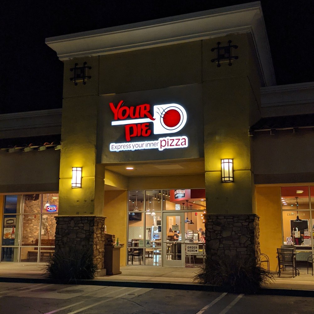 Your Pie Pizza - the front of a restaurant at night - Pizza Near Me - Indio, California Your Pie Pizza - the front of a restaurant at night - Pizza Near Me - Indio, California
