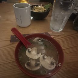 Miso soup and salad - included with the meal I ordered. Miso soup and salad - included with the meal I ordered.