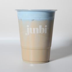 Junbi Matcha & Tea - Rowland Heights - Double shot hojicha latte, layered with blue coconut cream cloud made with organic blue spirulina.