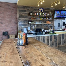 a wooden table and bar