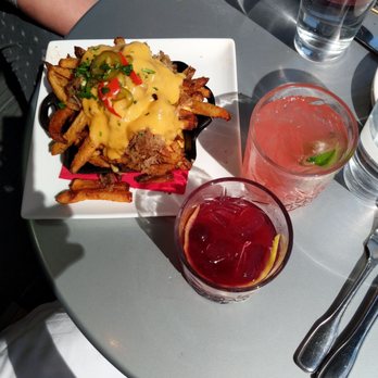 Von's 1000Spirits - Pork poutine fries and drinks - New American Near Me - Seattle, Washington Von's 1000Spirits - Pork poutine fries and drinks - New American Near Me - Seattle, Washington