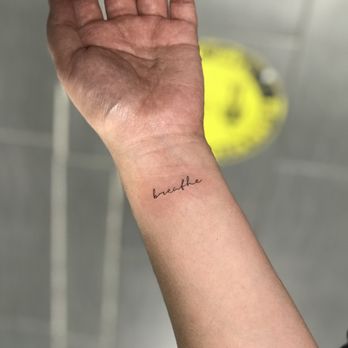 Jing’s Tattoo - "Breathe" on wrist - Tattoo Near Me - Flushing, New York Jing’s Tattoo - "Breathe" on wrist - Tattoo Near Me - Flushing, New York
