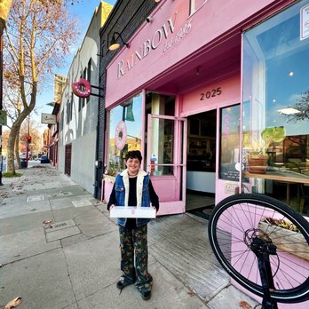 Rainbow Donuts - Outside of Rainbow Donuts, son ordering Specialty holiday donuts for staff on his Birthday. - Bakeries Near Me - Berkeley, California Rainbow Donuts - Outside of Rainbow Donuts, son ordering Specialty holiday donuts for staff on his Birthday. - Bakeries Near Me - Berkeley, California