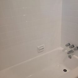 Tubs R Us - Refinished tub and tiles that were yellow and pink.