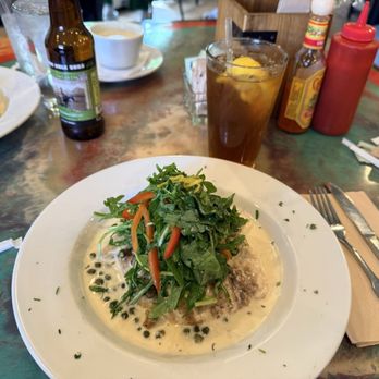 Roots Café - Organic Chicken Piccata with Grilled Polenta Cake, topped with Baby Arugula. Yummy!!!  Iced Tea - I'd recommend passing on that!! - Cafes Near Me - East Millcreek, Utah